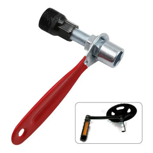 Bicycle crank puller fitted with a red-handled wrench, with an inset showing the tool attached to a crankset.