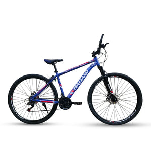 Side profile of Italiano M216 mountain bike in blue and red with front suspension fork and disc brakes.