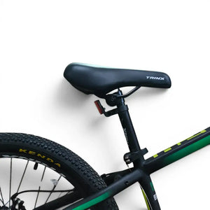 Close-up of comfortable Trinx mountain bike saddle and rear frame on Trinx K024 24-inch green bike