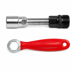 Black and silver bicycle crank puller displayed beside a red-handled ring wrench on a white background.