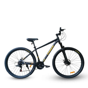 Trinx M007 PRO 29-inch mountain bike in black with yellow branding, shown from a side profile featuring front suspension fork, disc brakes, and Kenda tires on a white background.