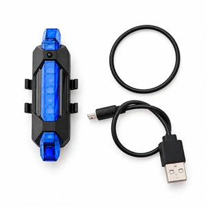 Blue rechargeable bicycle tail light with mounting band and USB charging cable