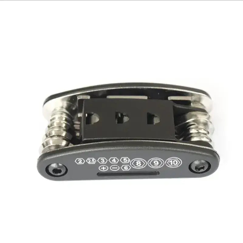 Folded black and silver 16-in-1 bicycle repair multi-tool with numbered function labels on a white background