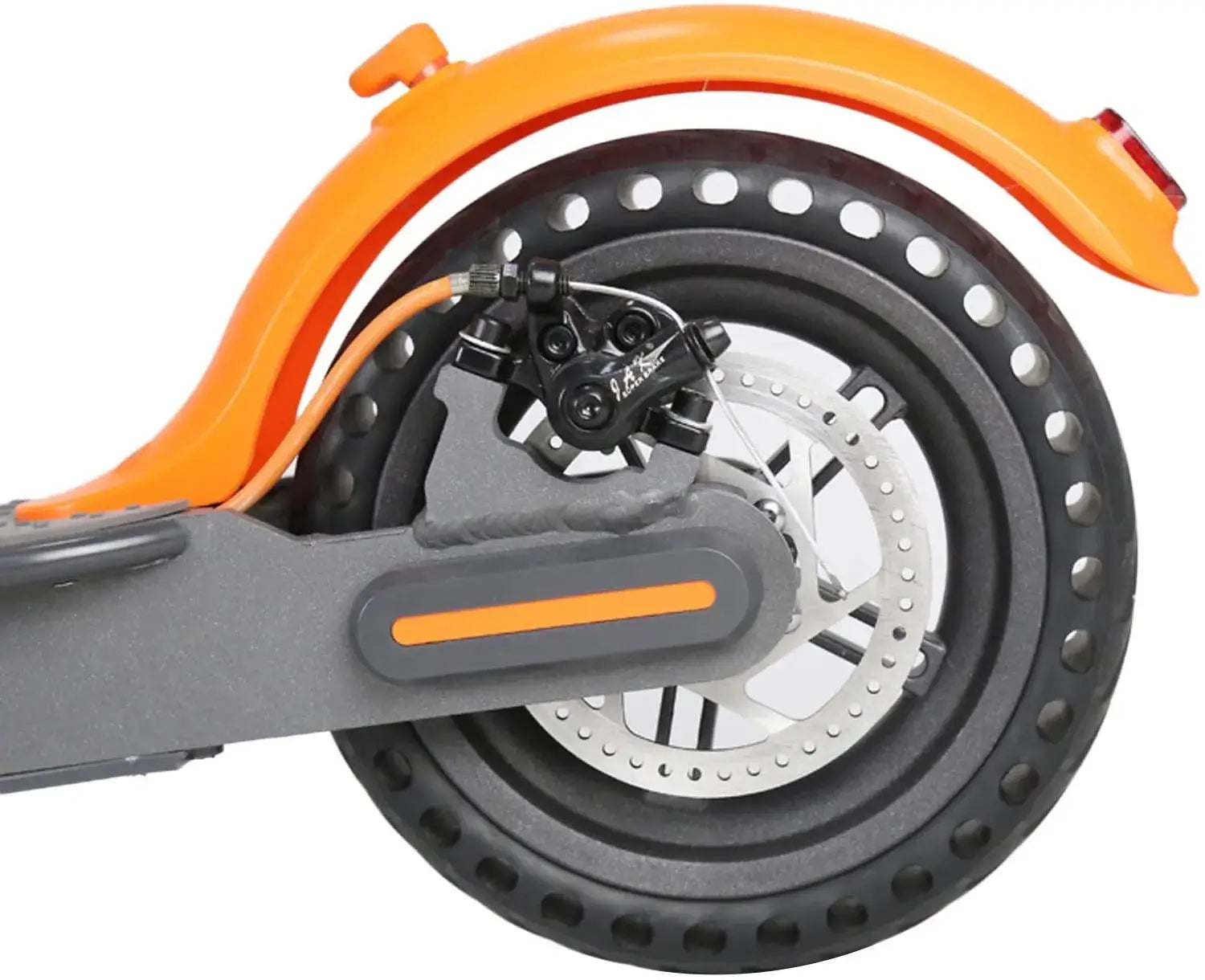 Close-up of an electric scooter rear wheel with installed 8.5-inch solid tire, disc brake, and orange fender