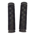 Pair of black bicycle handlebar grips with a textured chevron pattern on a white background