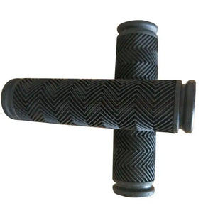 Pair of black bicycle handlebar grips with textured chevron pattern arranged in a cross shape on a white background