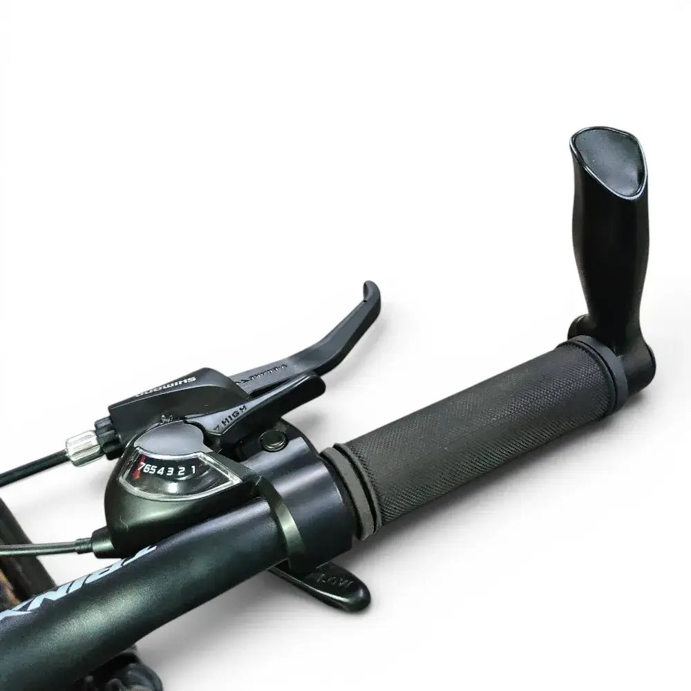 Trinx K024 mountain bike handlebar grip with Shimano gear shifter, brake lever, and bar end