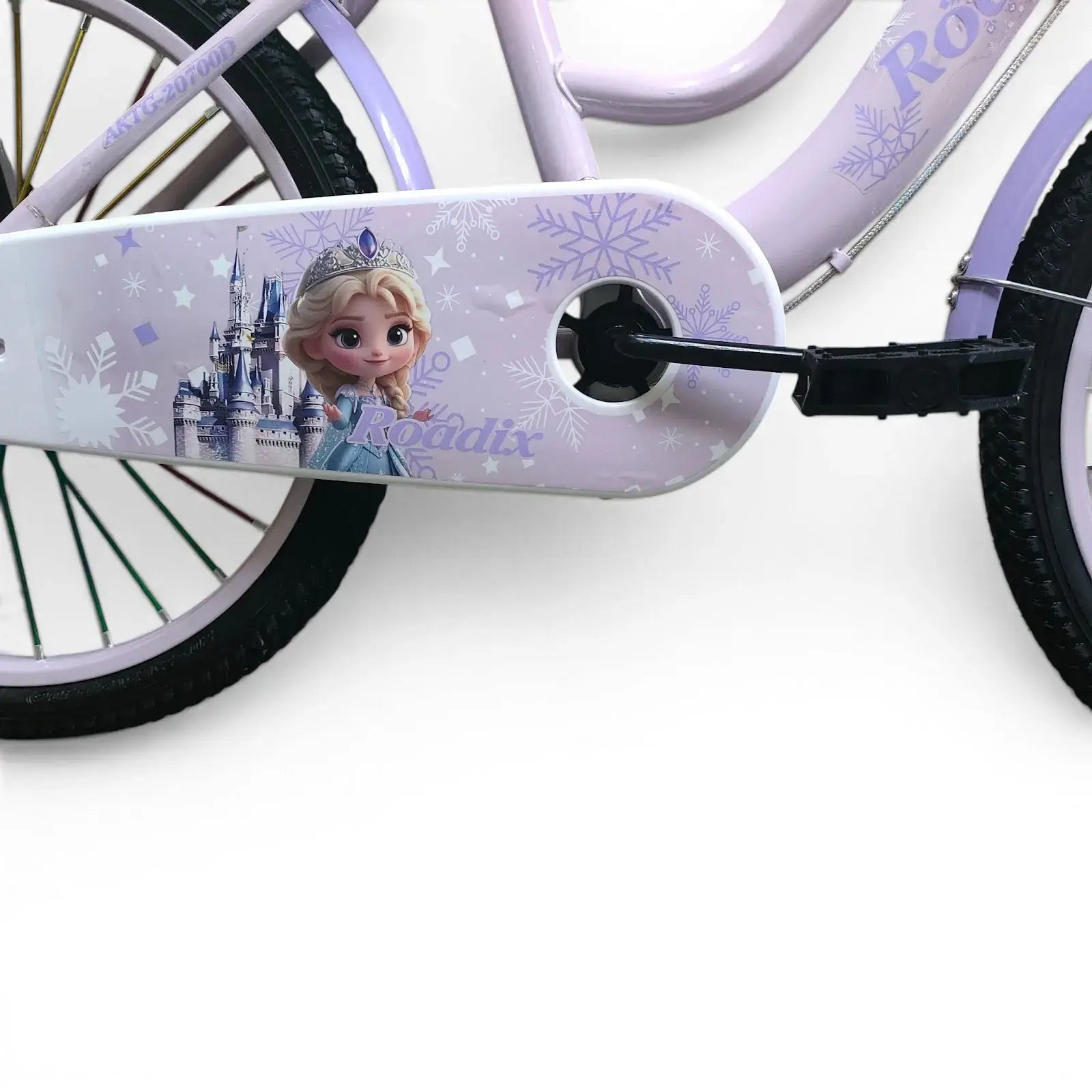 Close-up side view of the chain cover with Frozen graphics and pedal of a Purple Roadix girls bicycle.