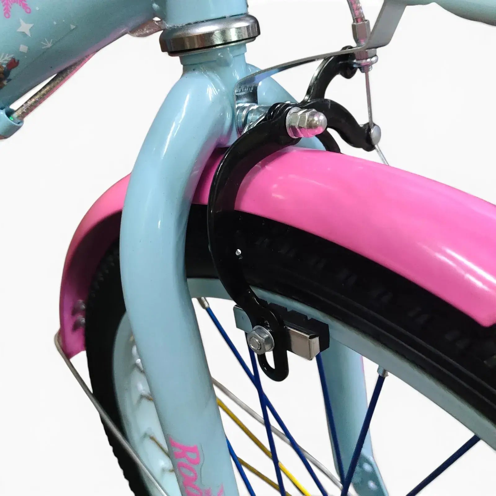 Close-up side view of the front wheel, Blue fender, and brake system of a Roadix girls bicycle.
