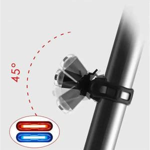 Bicycle tail light mount demonstrating 45-degree angle adjustment on a seatpost.