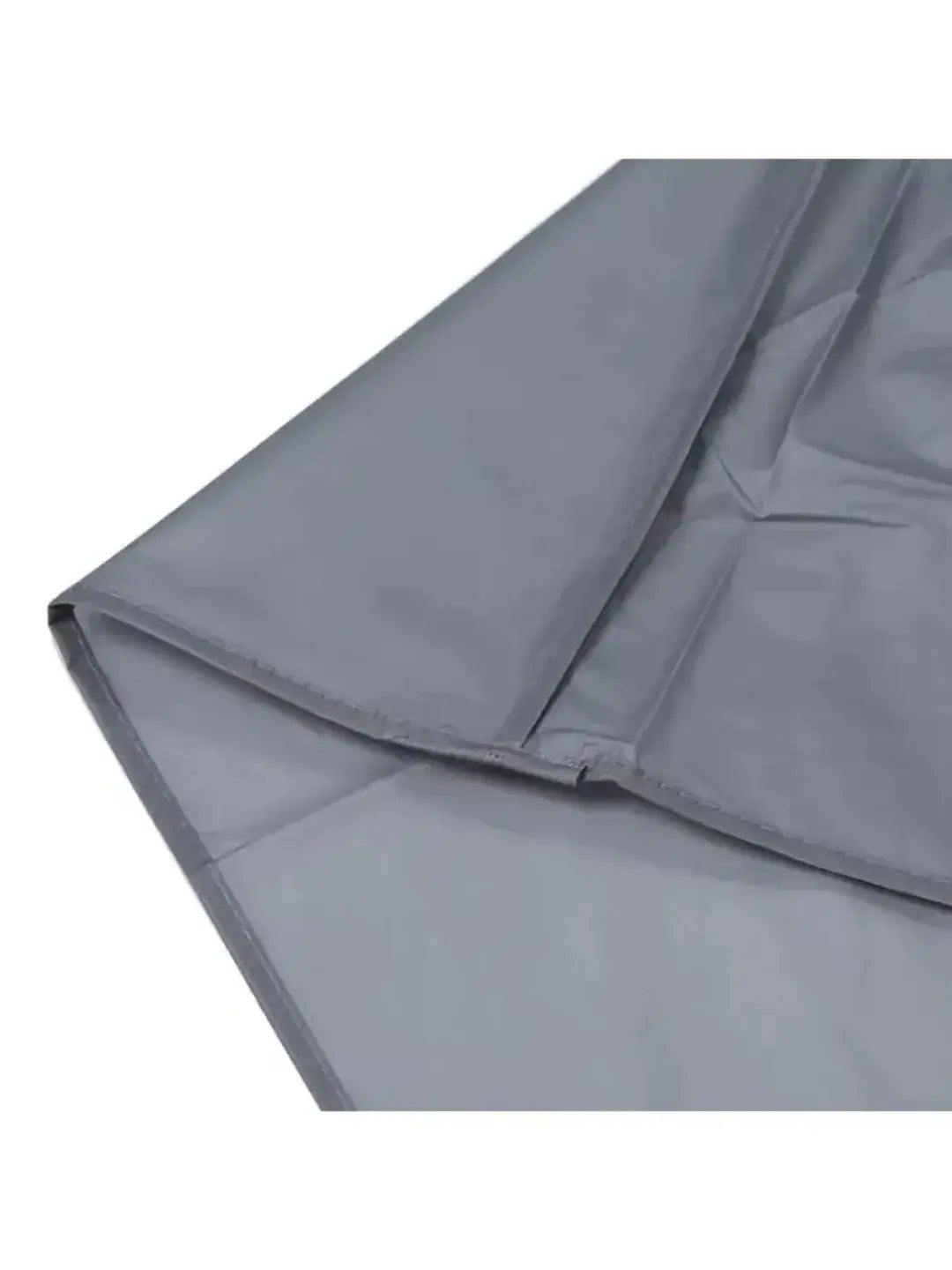 Close-up view of a silver-gray waterproof bicycle cover showing a reinforced metal lock hole and folded hem, isolated on white background