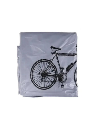 Folded silver bicycle protective cover featuring a black bike graphics print, isolated on white background