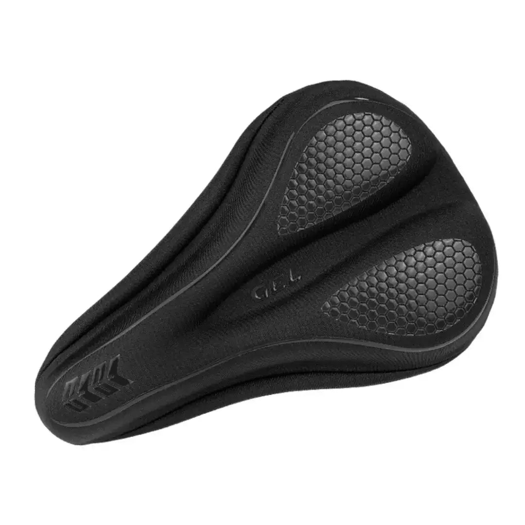 Underside view of a black bicycle saddle cushion cover showing anti-slip textured grip padding with central GEL branding, isolated on white background