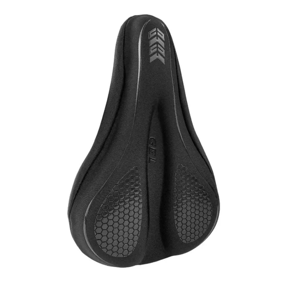 Black bicycle saddle cushion cover featuring honeycomb textured seat padding and gray arrow emblem on top, isolated on white background