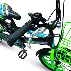 Close-up of handlebars, bell, metal brake lever, and green front basket on Super Hero 16-inch kids bike.