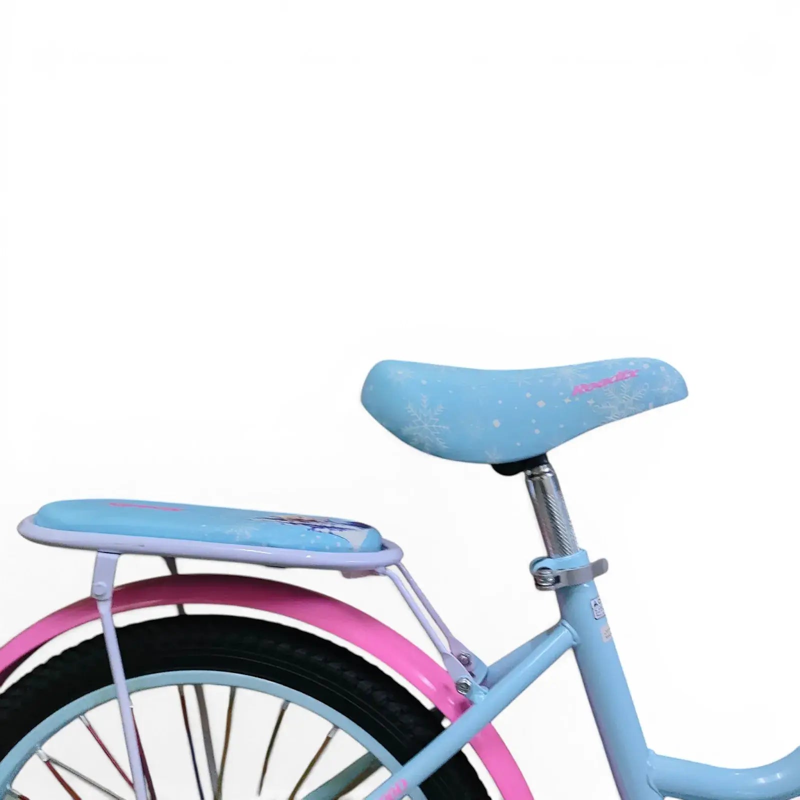 Close-up side view of the adjustable Blue saddle and padded rear seat of a Roadix girls bicycle.
