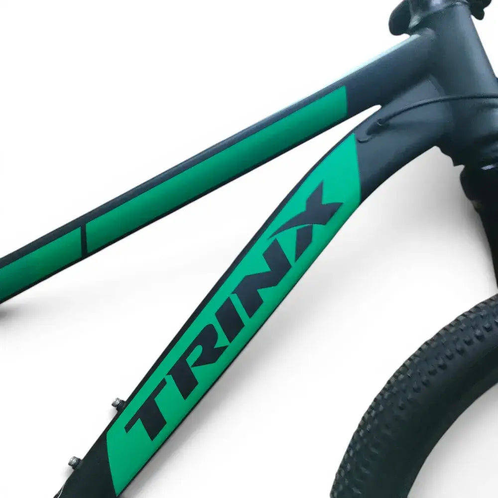 Trinx K024 mountain bike down tube with green accents and bold TRINX branding