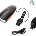 Rechargeable bicycle headlight and horn kit with black and orange light unit, handlebar mount, wired remote button, and USB charging cable.