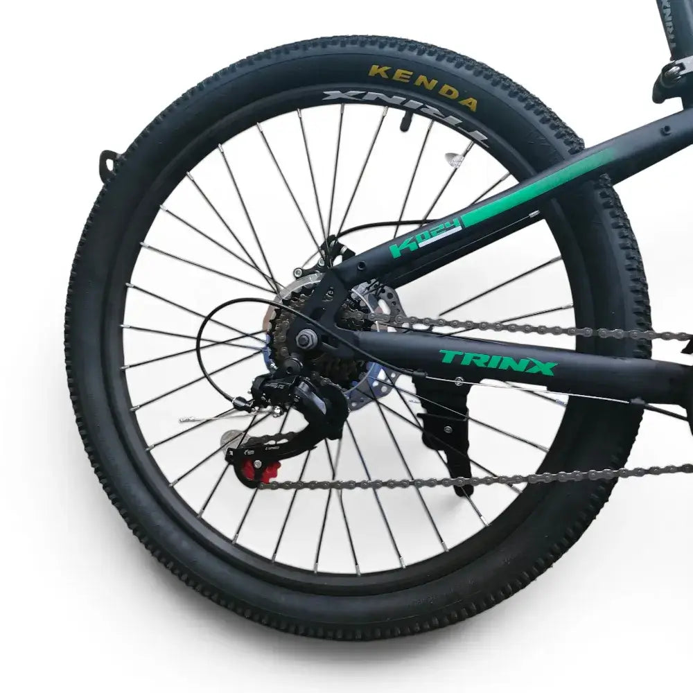 Trinx K024 24-inch mountain bike rear wheel with Kenda tire, rear derailleur, and mechanical disc brake