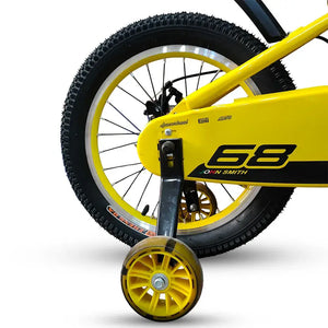 Close-up of RF 16-inch yellow kids bike rear wheel, chain guard, and yellow training wheel