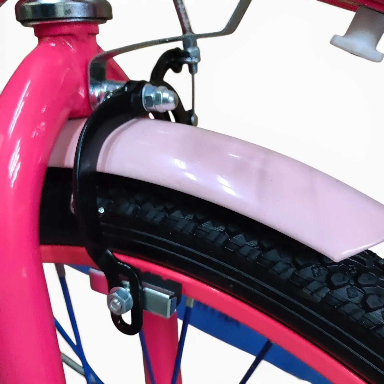 Close-up side view of the front wheel, Fuchsia fender, and brake system of a Roadix girls bicycle.