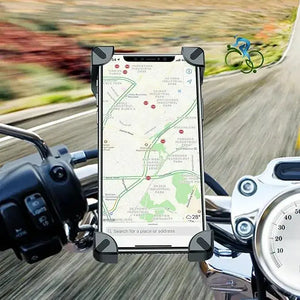 Smartphone with GPS navigation map mounted in a black handlebar phone holder on a motorcycle in motion