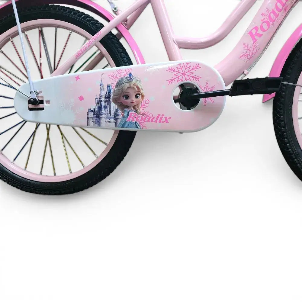 Close-up side view of the chain cover with Frozen graphics and pedal of a pink Roadix girls bicycle.