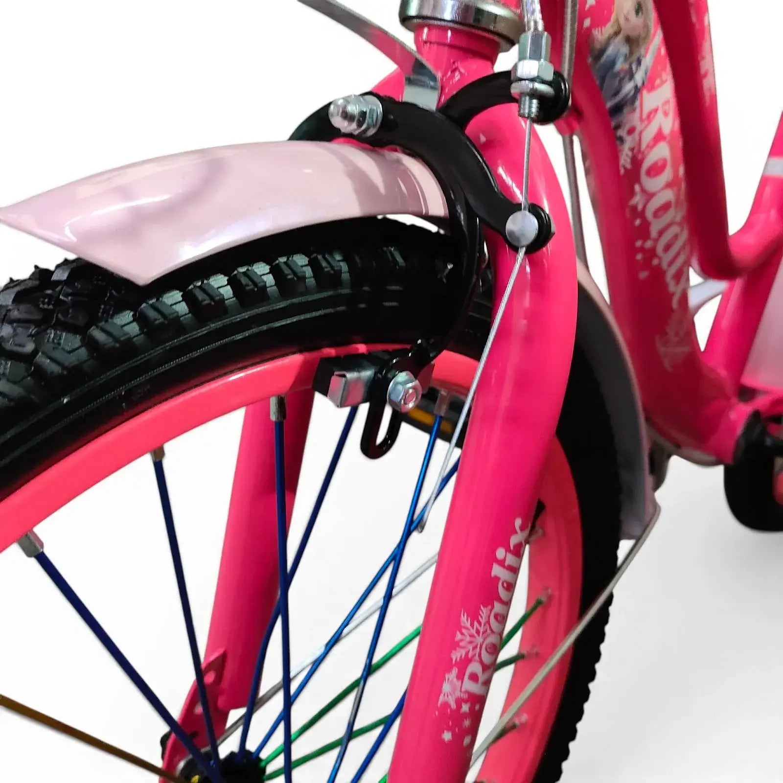 Close-up side view of the front wheel, Fuchsia fender, and brake system of a Roadix girls bicycle.