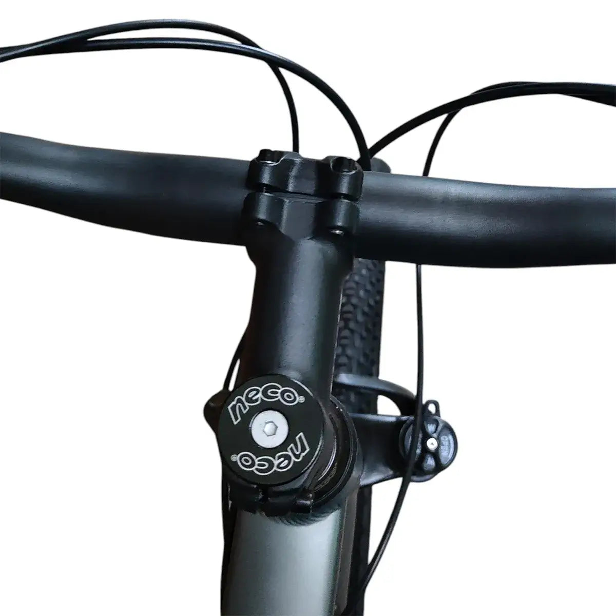 Close-up of Trinx M007 PRO mountain bike stem and handlebar headset area, featuring black handlebars, brake cables, and a Neco top cap.