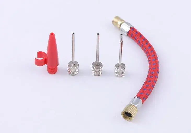 Maxlerz inflation accessories arranged upright with three ball needles, a red tapered nozzle, and a flexible Schrader hose.