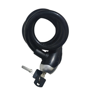 Coiled black bicycle cable lock with two keys attached, one inserted into the lock head, isolated on a white background.