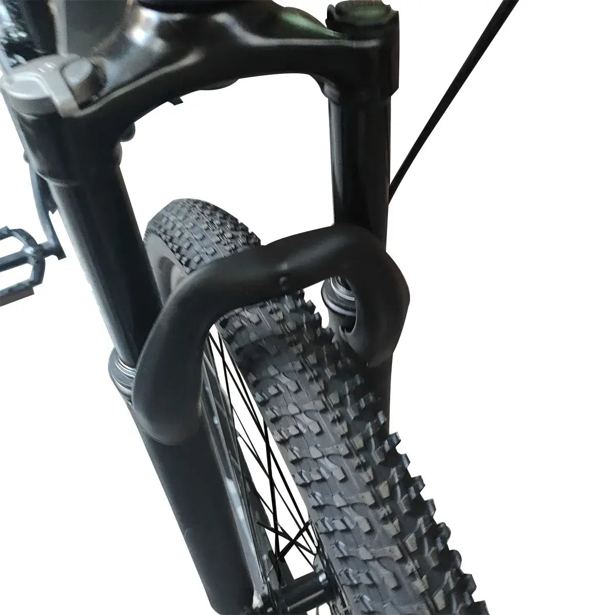 Close-up view of front suspension fork arch and tire tread on Trinx mountain bike, isolated on white background